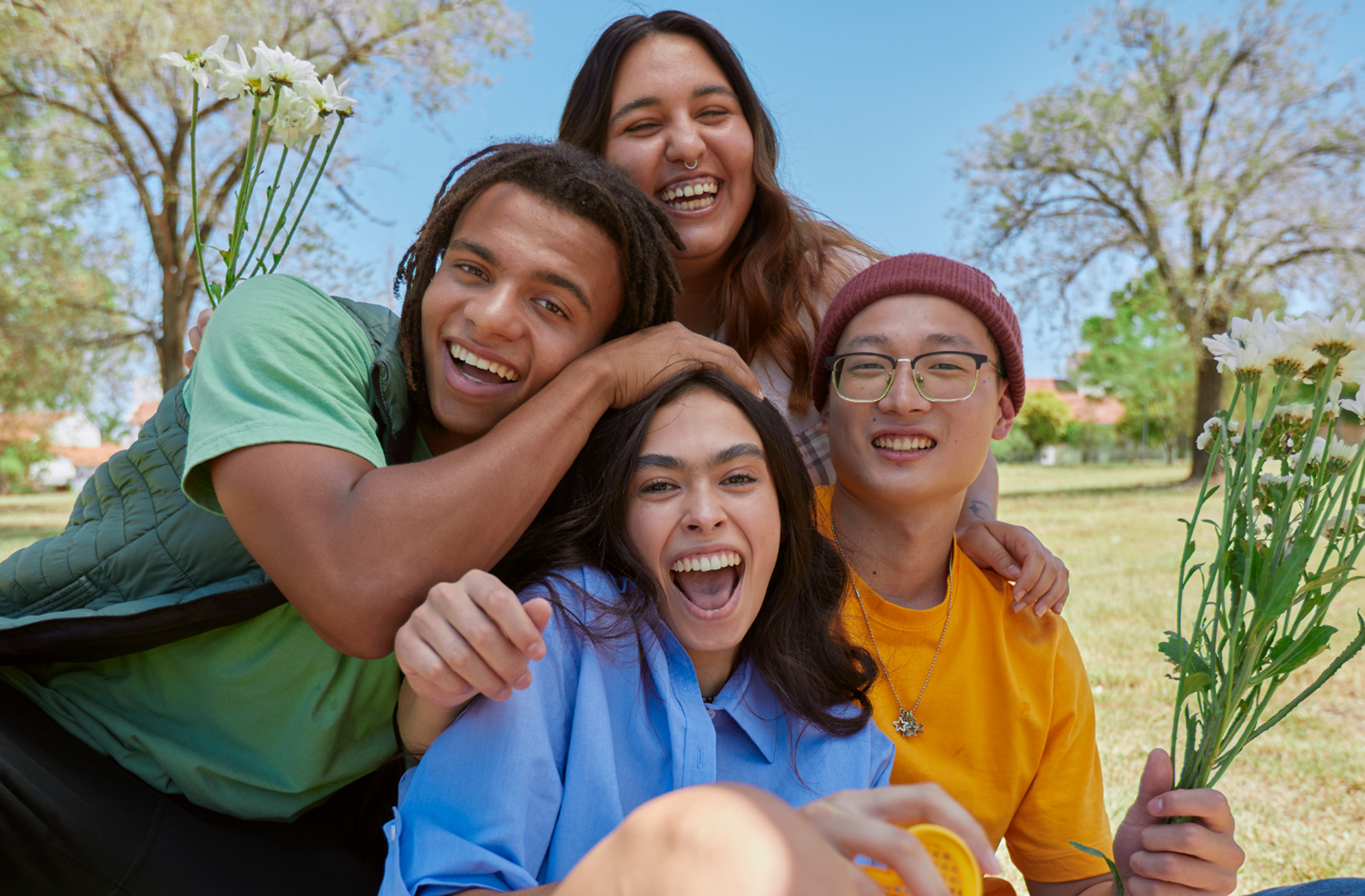 Group of young adult couples in a park